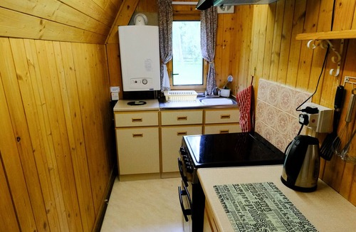 Beauly Ski Chalet | Secluded, cosy cottage on the banks of a Highland river